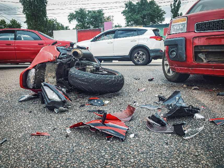 motor vehicle accidents including a red motorcycle and a red car
